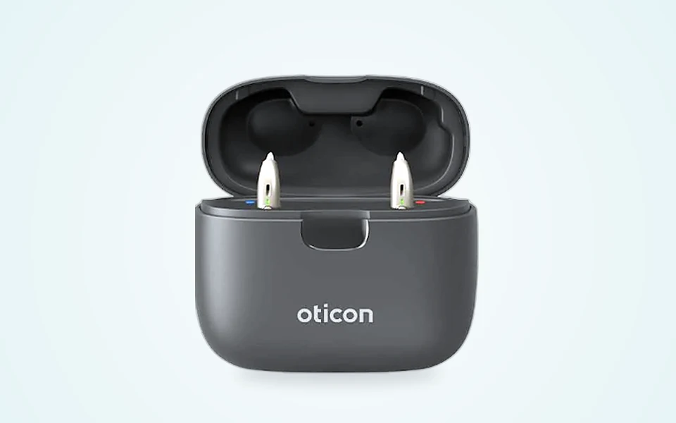 Oticon Real RIC hearing aids with charging case